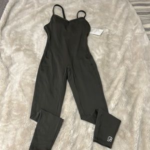 Bombshell body suit . Size medium . Never worn